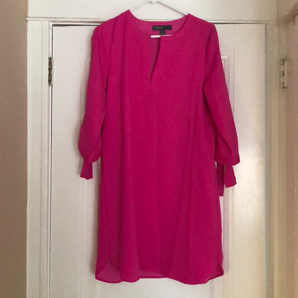 NWOT pink dress with bow detail at the elbow!